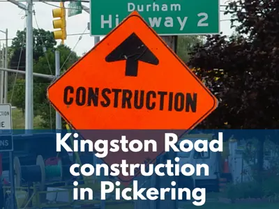 Orange diamond-shaped construction sign with a black arrow pointing straight ahead stands in front of a green “Durham Highway 2” road sign. Construction vehicles and roadside equipment are visible in the background. A blue banner overlay across the lower half of the image displays the text: “Kingston Road construction in Pickering.”